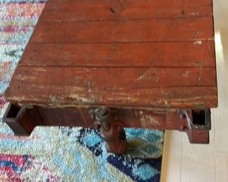 Repurposed wooden coffee table will steal the show at any conversation.