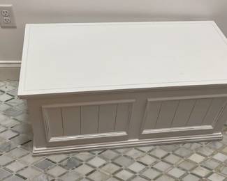 White wooden storage bench