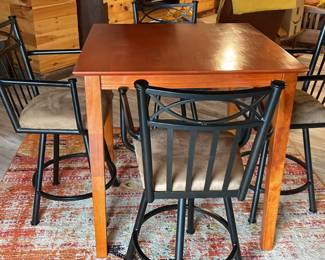 High top table with 4 swivel chairs.