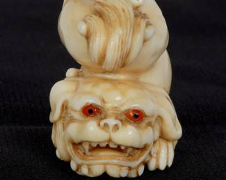 Edo Shishi Netsuke signed Tomotada
