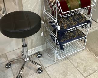 Rolling stool; decorative pillows