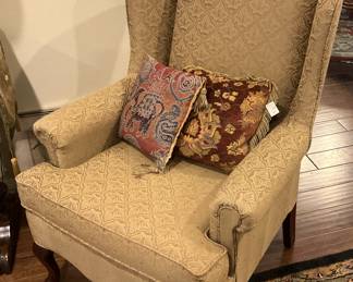 Wingback chair; decorative pillows