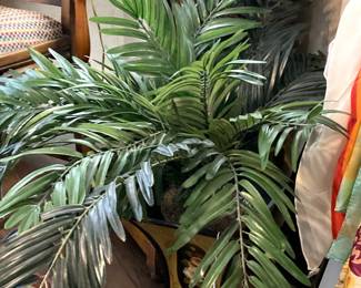 Container and large artificial palm 