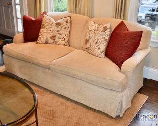 A. Rudin cream colored sofa.