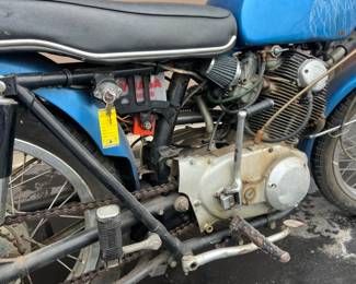 There are a dozen 1970s motorcycles