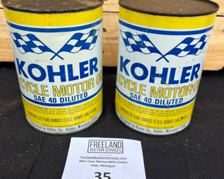 Snowmobile advertising oil cans