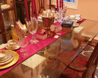 Double Rams Head pedestal dining table with glass top