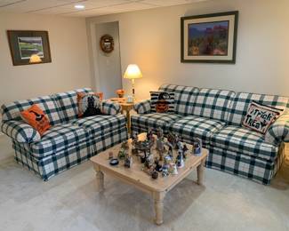 Couch and loveseat, coffee table, figurines 