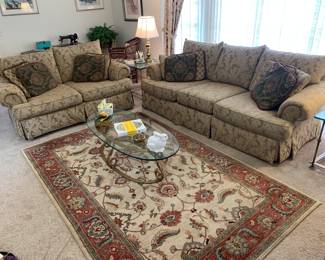 Like new couches, coffee table, area rug