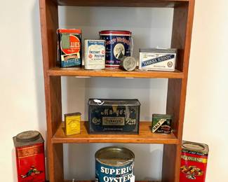 Antique Tins and  and primitive bookshelf (sitting on table)