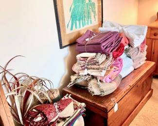 Antique pine trunk; linens; Christmas stockings