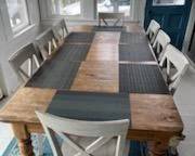 Rustic dining table seats 8. Table made by Ethan Allen. Table is 40" wide and 89" long when the 20" leaf is in place as shown