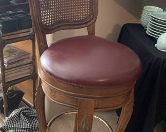 Pair of Cane and Leather Swivel Bar Stools