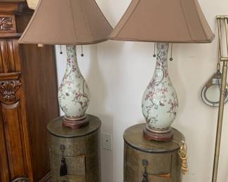 Pair of contemporary Asian lamps, and pair of impressed tin round side tables