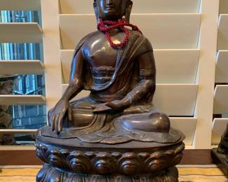 Seated Bronze Buddha on a double lotus