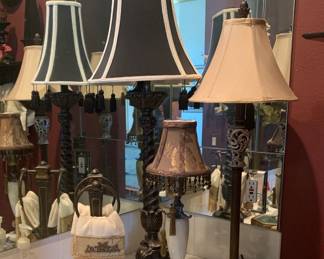 Extraordinary collection of tall "candlestick" lamps