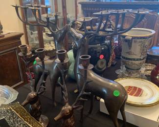Pair of solid brass reindeer candlelabras and pair of elk candle holders