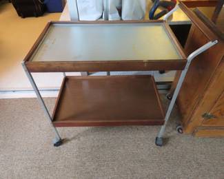 Teak heated tea trolley.