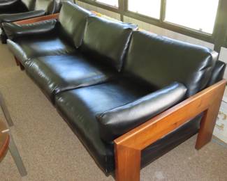 Leatherlike sofa with wood frame, 1961.