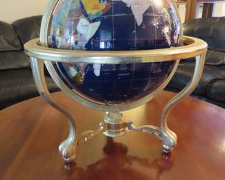 Semi precious inlaid stones world globe.