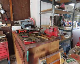 Miter saw, heavy duty drills, sander, vice.