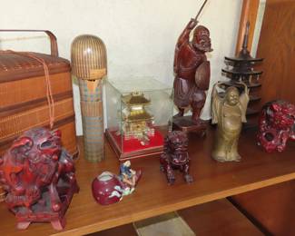 Asian figures and foo dogs.