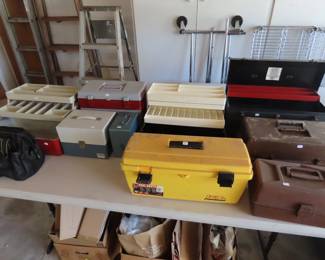Multiple tool boxes.