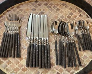 Hand hammered Handle MODERN flatware service (never used)