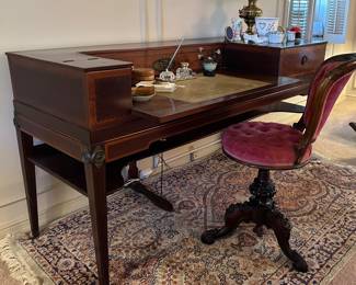 Unusual and rare piano forte, converted into writing desk with pull-out  tooled leather 
Writing surface, turn of the 20th century pedestal chair