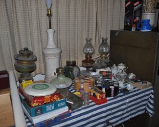 Antique oil lamps,several Mid Century lamps and other collectables. 
