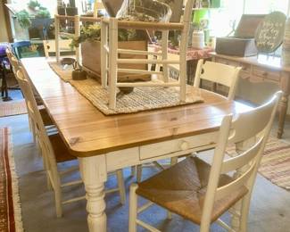 2nd view-Ethan Allen dining table with two leaves and 10 chairs, drawer on end cap