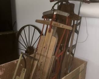 Vintage sleds, wooden crate