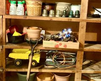 Several flower planters, shovel, chemicals, etc.