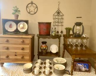 Ethan Allen 3 drawer chest, two side tables, advertising box, Red Wing Pompeii dinnerware, stems, misc. decor