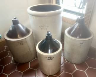 Close-up view of crock, jugs (5 gal jug on left has a hairline crack)