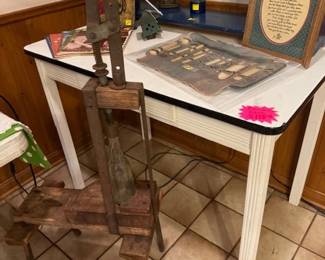 Ceramic Metal Antique Kitchen Table and in Front an Antique Bottle Caper