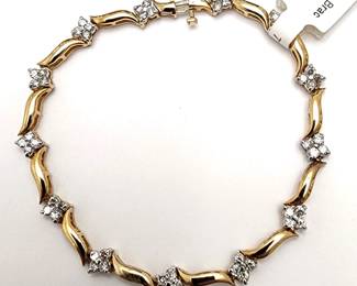14k gold & diamond tennis bracelt 