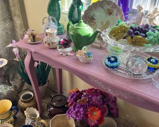 assortment of home decor, vases, pots, and paper weights 