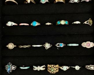 JUCR939 Womens Rings 33 rings, some vintage and costume. Mixed metals and stones including a Seahawks ring.