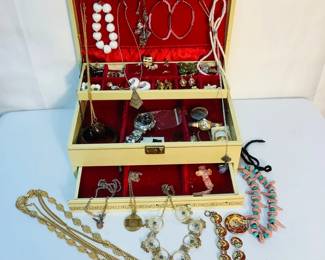 GRLE319 Vintage Jewelry In A Jewelry Box Lot includes Murano Glass Wedding Cake Earrings, a Wenger Swiss Military watch, women's watches, bracelets, necklaces earrings galore.- Earrings are clip-on. One of the large white hoop earrings is broken.