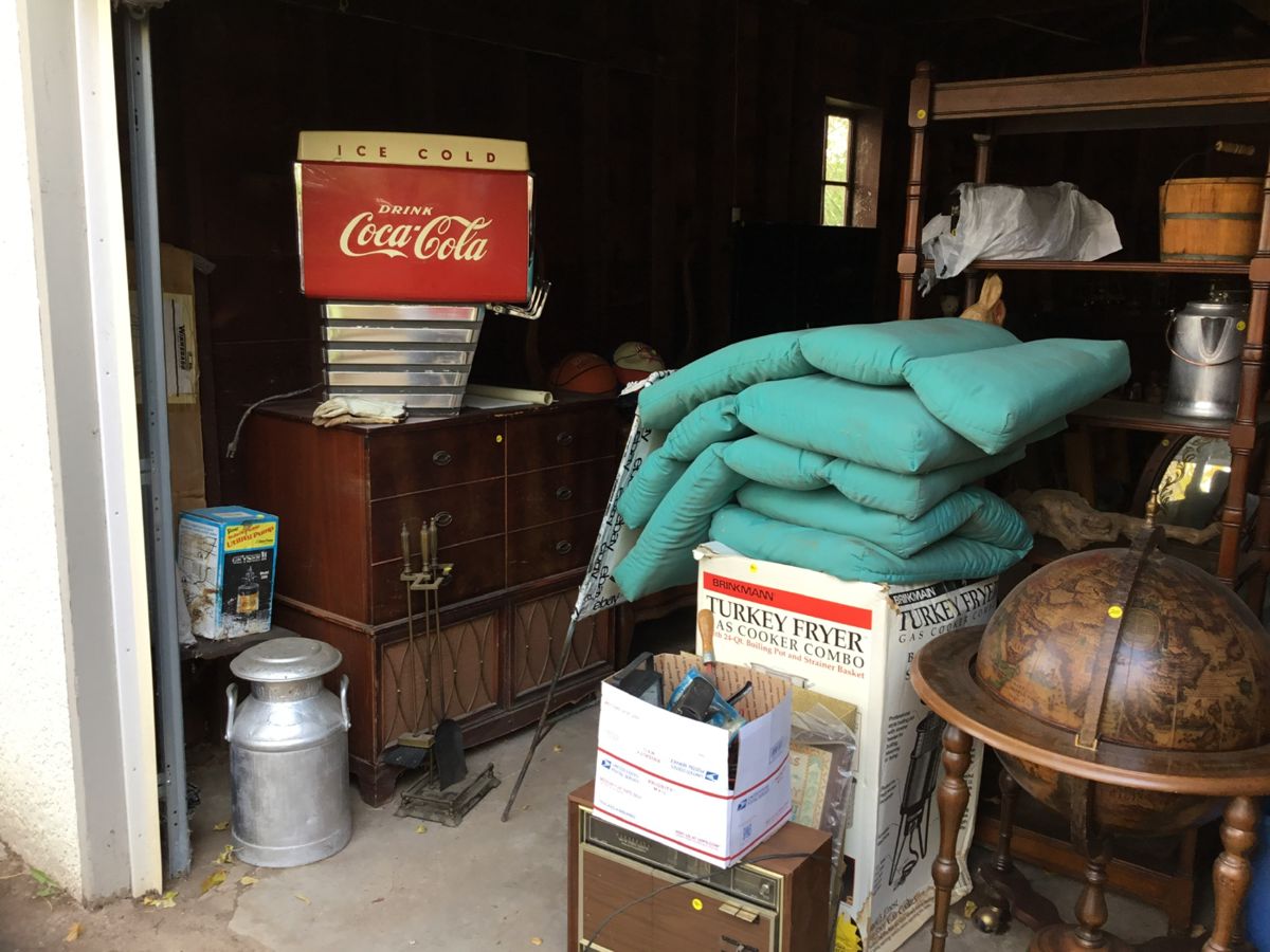 Vintage CocaCola dispenser, screen porch, bar globe.