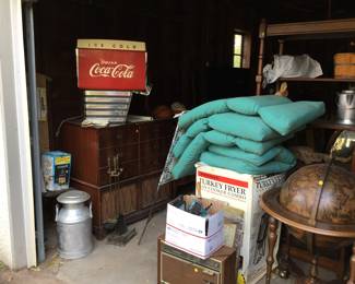 Vintage CocaCola dispenser, screen porch, bar globe.