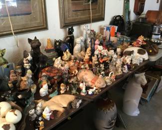 Many animal figurines, lots of cats!