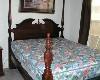 Four poster bed. Also has the higher posts for the footboard. No mattress. $125