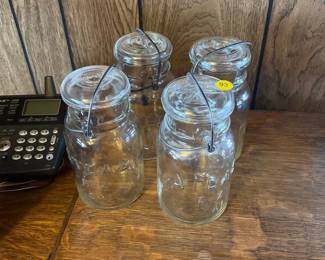 FOUR LIDDED ATLAS JARS