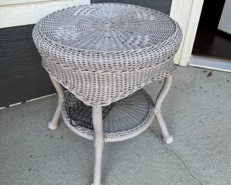 A115 - $25. Single Round Plastic Rattan Table. 