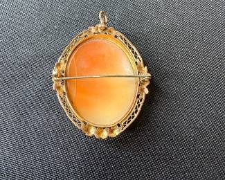 J10  - $125. 14kt gold brooch. 8.3 grams with stone. 