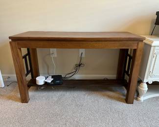 A30 - $60. Sofa table with metal sides. Measures 48" wide x 18" deep x 24.5" tall. 