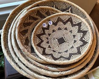 A62 - $80 Set of 7 woven baskets / wall hangings. 