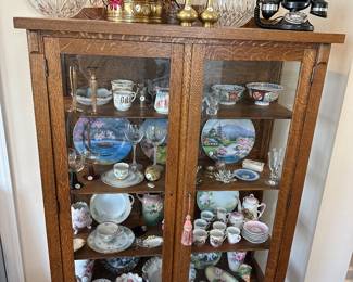 A9 - $275. Antique Cabinet with glass front and sides. Measures 40" wide x 15.75" deep x 58.75" tall. Excellent condition. 